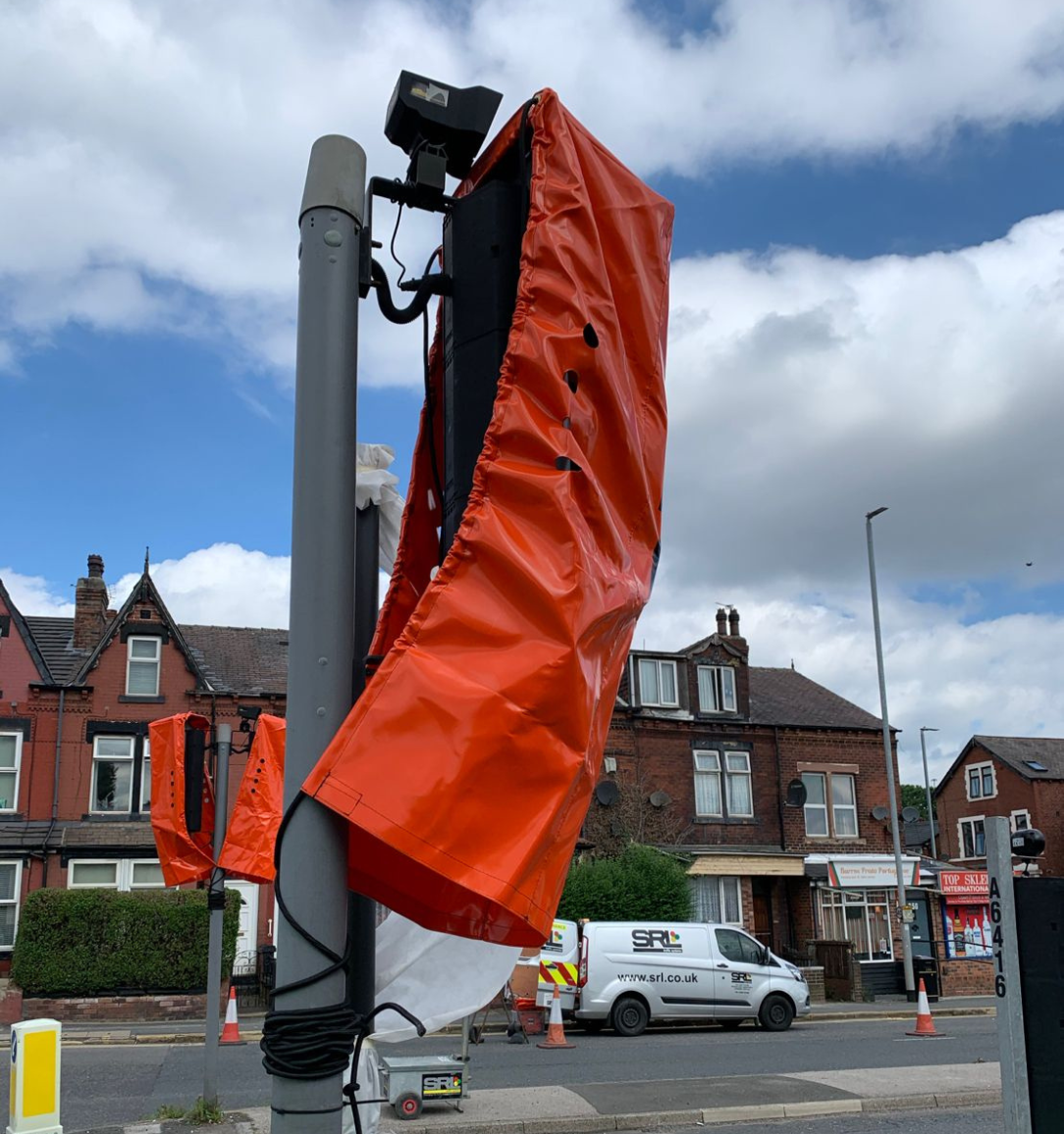 IRSS Traffic Light Covers Bagging Off, Better.